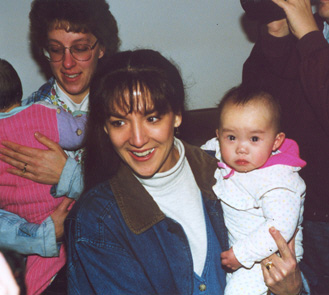 Valerie holding Emily on Gotcha Day