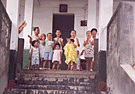 Photo of children at top of stairs